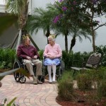 Two residents are king and queen for the day as they share a peaceful birthday in the garden. A familiar garden setting at a nursing home provides opportunities to hold special events outside where families and residents can gather and celebrate.